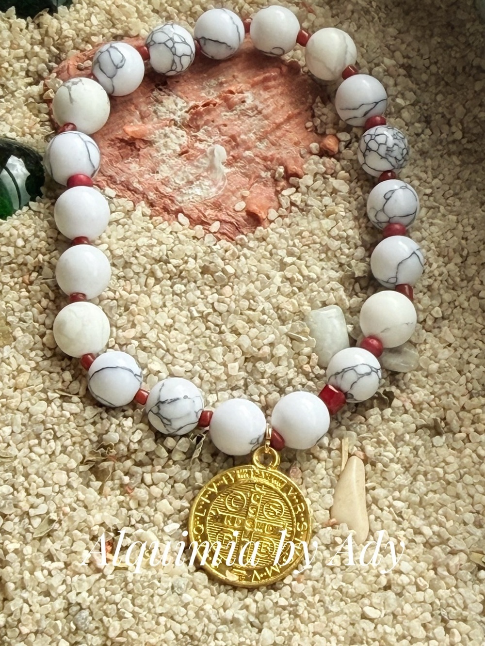 White Howlite Beaded Bracelet with Red Spacers and Gold Saint Benedict Coin